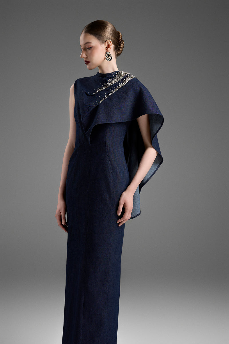 Dark blue asymmetric draped shoulder A-line maxi dress by GVLUX, featuring elegant flowing fabric and a stylish silhouette.