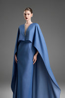 Blue V-neck kaftan gown with dolman sleeves by GVLUX, featuring elegant flowing fabric and stylish relaxed fit.