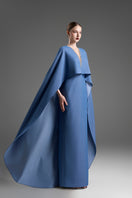 Blue V-neck kaftan gown with dolman sleeves by GVLUX, featuring elegant flowing fabric and relaxed fit.