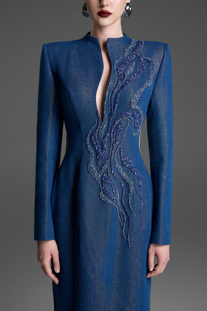 Blue column gown with crystal embroidery by GVLUX, featuring elegant fitted silhouette and intricate embellishments.