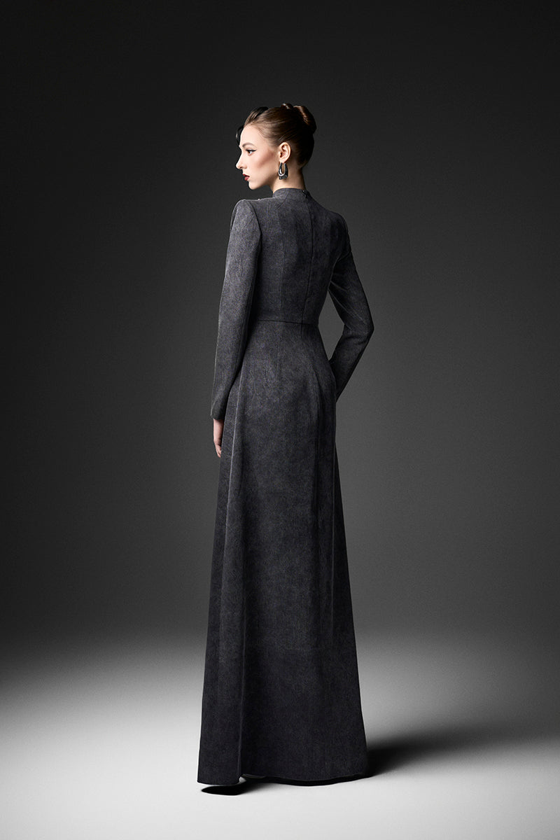 Black long sleeve gown by GVLUX, Midnight Fireworks design, elegant evening dress with intricate pattern and flowing fabric.