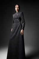Black long sleeve gown from GVLUX Midnight Fireworks collection, elegant evening dress with intricate design details.