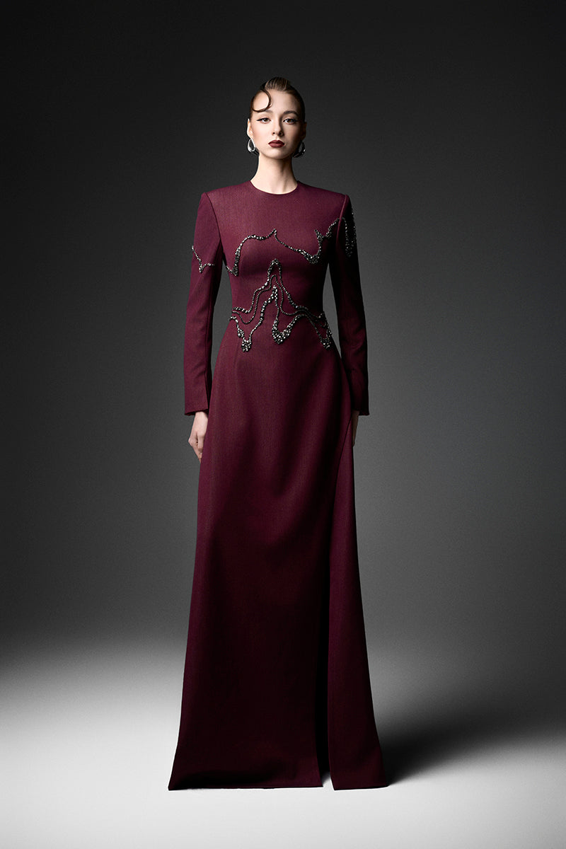 Long sleeve ox embroidered gown by GVLUX featuring intricate embroidery and elegant design, perfect for special occasions.