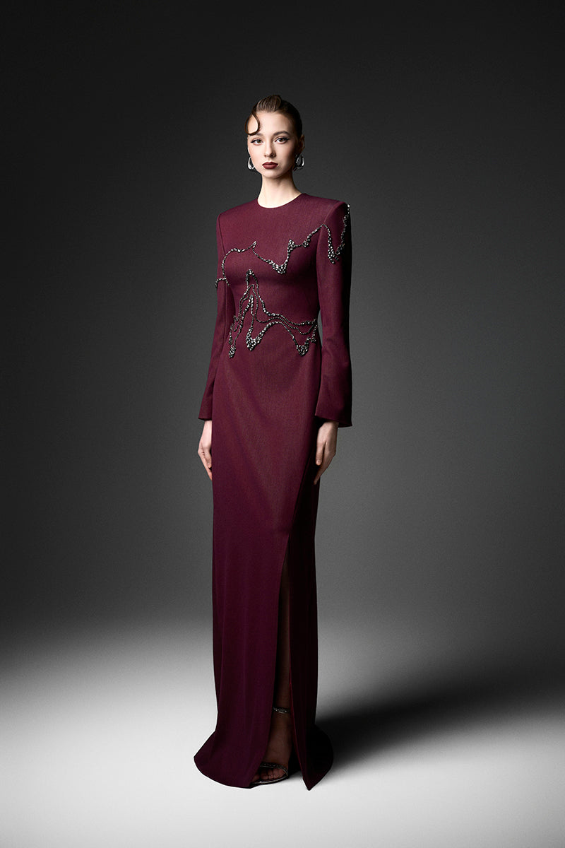 Long sleeve ox embroidered gown by GVLUX featuring intricate embroidery and elegant design, perfect for special occasions.