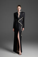 Black sheath gown with a wave neckline from GVLUX, featuring a sleek, fitted silhouette and elegant design.