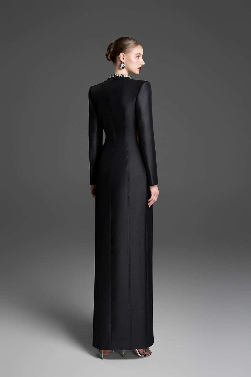 Black GVLUX sheath maxi dress with a stylish wave neckline, elegant and form-fitting for sophisticated occasions.