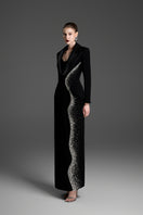 Black deep V-neck tailored sheath gown by GVLUX, featuring a fitted silhouette and elegant design for formal occasions.
