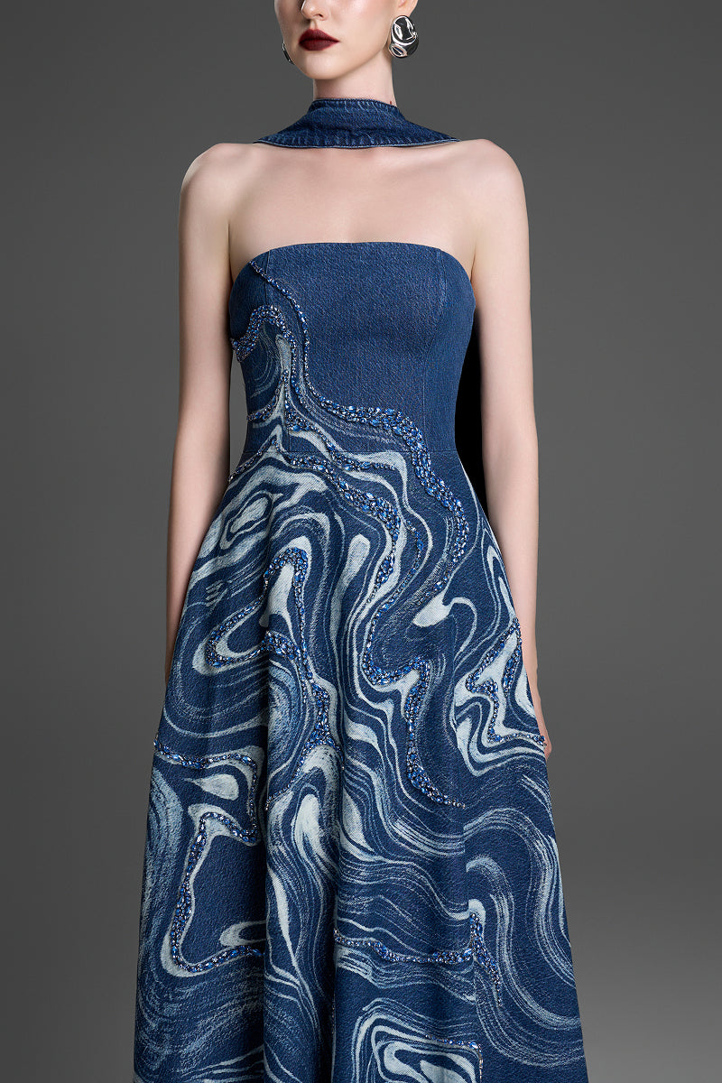 Blue strapless gown by GVLUX with crystal-embroidered marblewood design, elegant evening dress with intricate detailing.