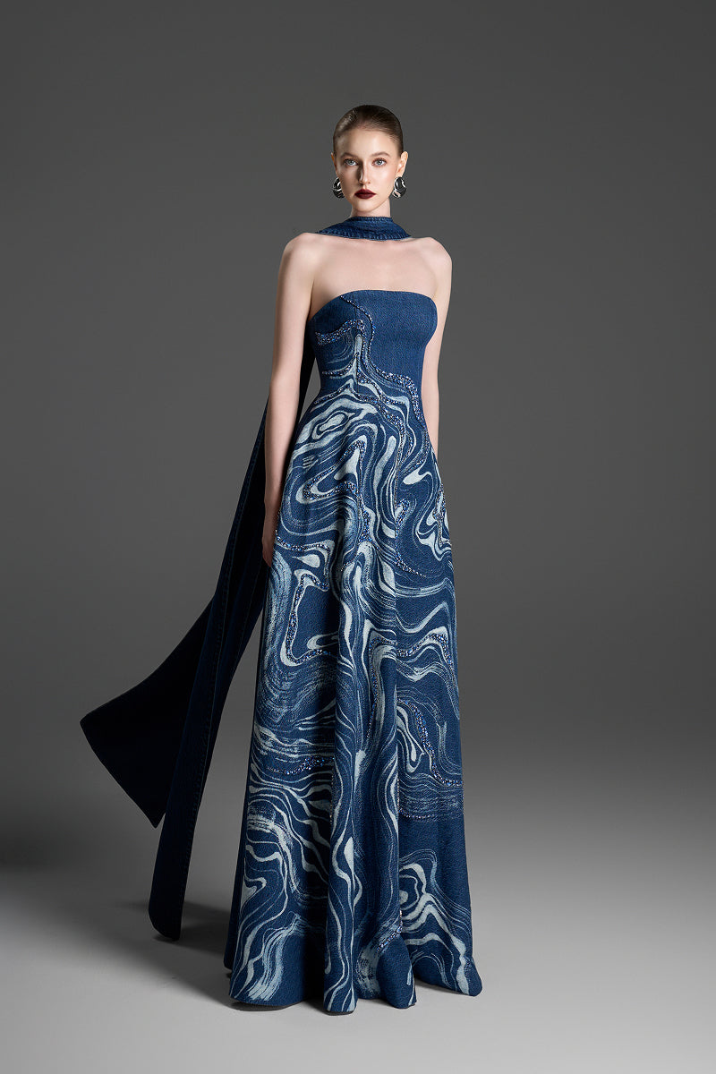 Blue strapless gown with crystal-embellished marblewood detailing by GVLUX, elegant evening dress with intricate embroidery.