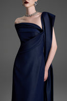 Dark blue A-line gown by GVLUX, elegant floor-length dress with a flowing silhouette and subtle fabric detailing.