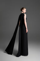 Black GVLUX A-line bustier gown with matching cape, elegant evening dress with fitted bodice and flowing skirt.