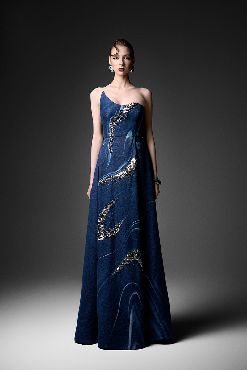 Elegant watercolor embroidery one-shoulder gown by GVLUX featuring intricate floral design and flowing fabric.