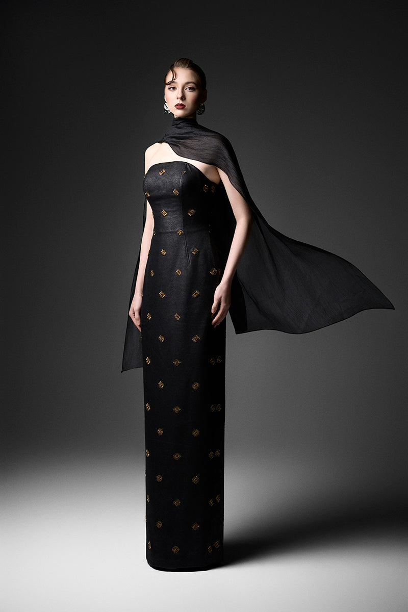Black cape neck sweetheart gown by GVLUX, featuring elegant flowing fabric and a fitted bodice for formal occasions.