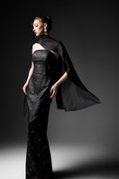 Black cape neck sweetheart gown by GVLUX featuring a flowing silhouette and elegant design, perfect for formal occasions.