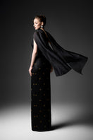 Black cape neck sweetheart gown by GVLUX featuring a flowing silhouette and elegant design, perfect for formal occasions.