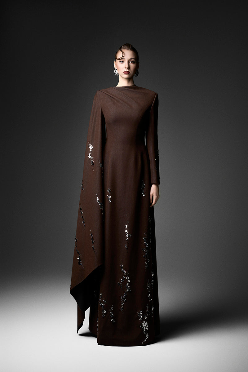 Elegant ELODIE deep tone embroidered gown by GVLUX, featuring intricate embroidery and flowing fabric.