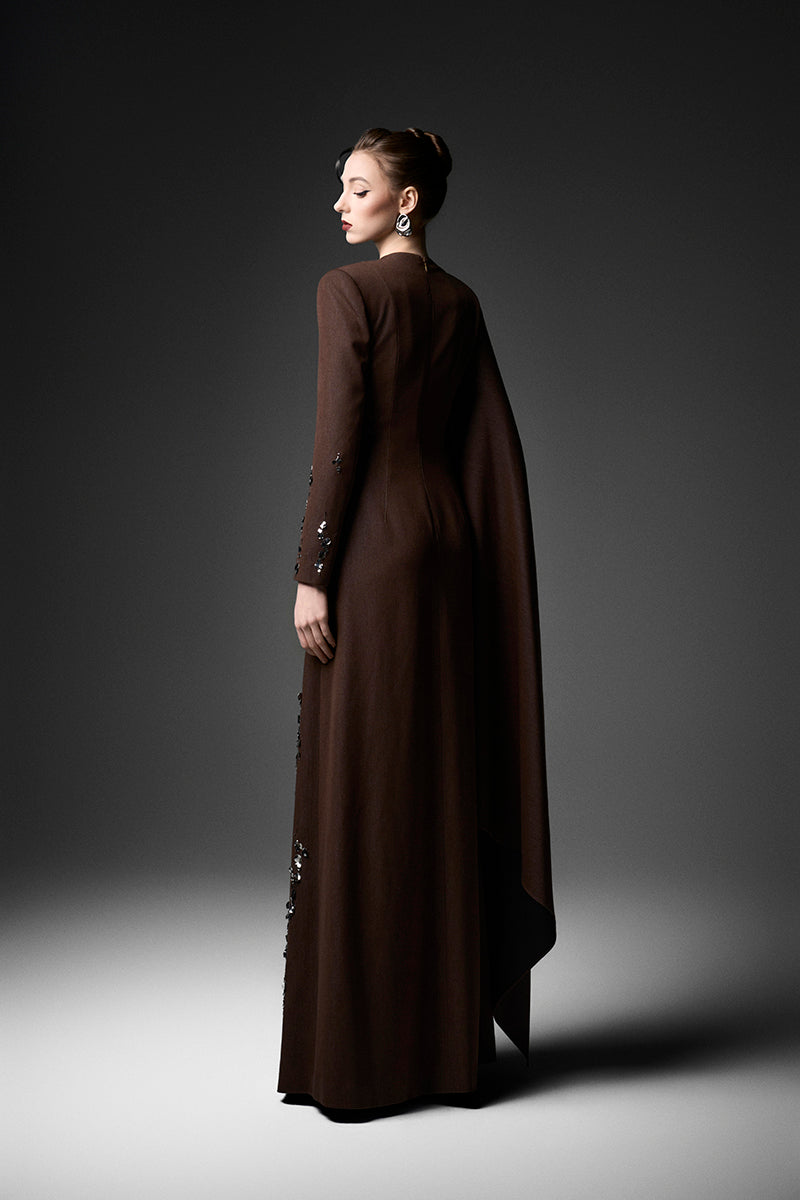 Elegant ELODIE deep tone embroidered gown by GVLUX featuring intricate embroidery and flowing fabric for special occasions.