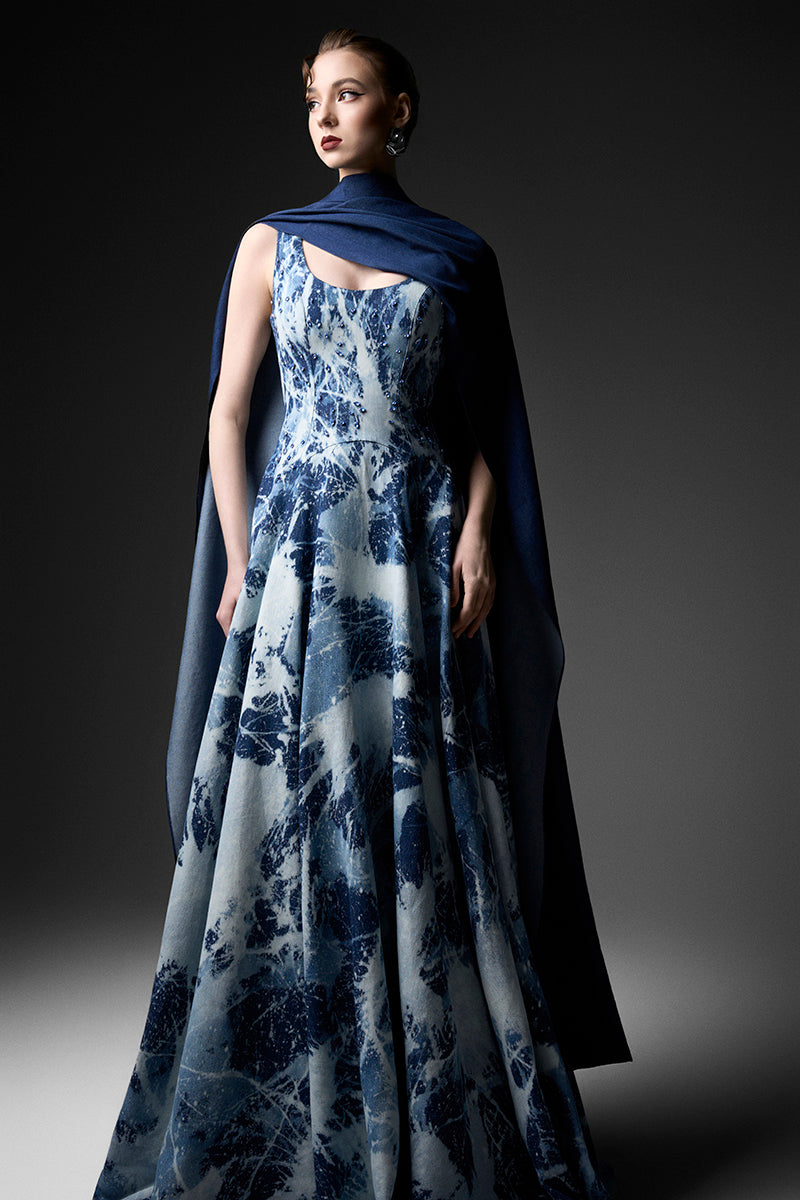 GVLUX WATER WORKS cape gown made of durable fabric, featuring a modern design and adjustable neck strap for professional use.