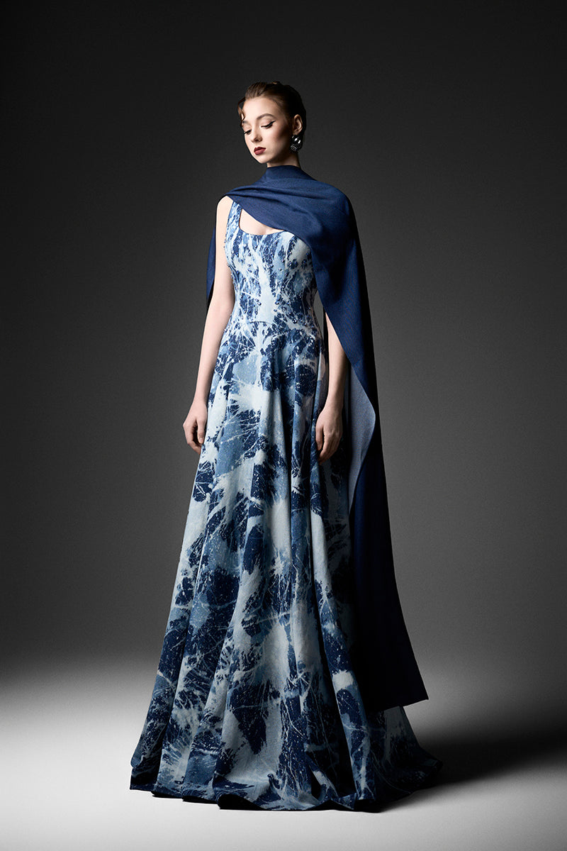 Water Works Cape Gown by GVLUX, featuring a stylish and functional gown design with water-resistant fabric and adjustable fit.