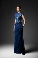 Elegant watercolor embroidery high neck gown by GVLUX featuring intricate floral designs and a flowing silhouette.