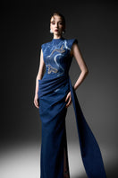Elegant watercolor embroidery high neck gown by GVLUX featuring intricate embroidery and flowing fabric.