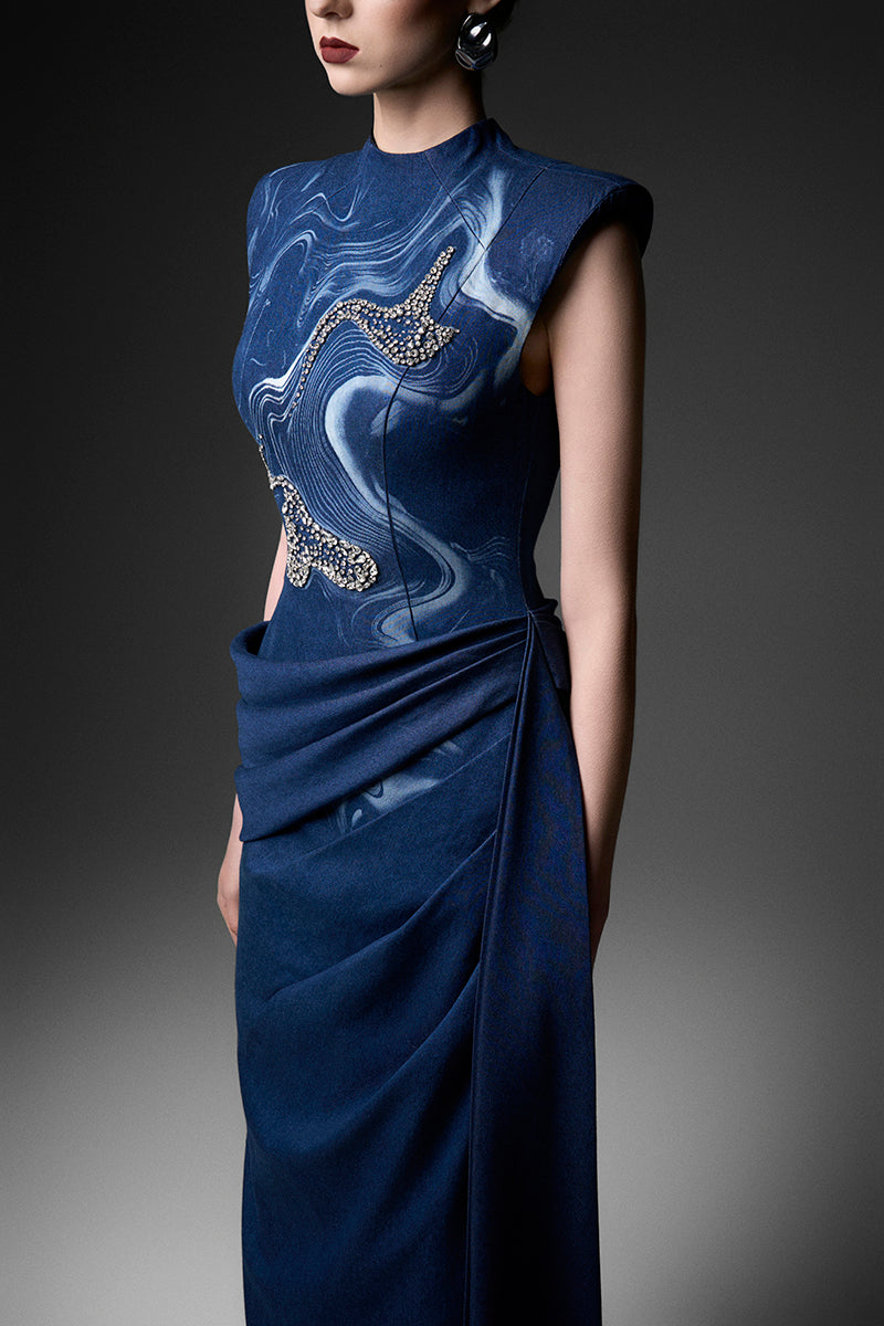 Watercolor embroidery high neck gown by GVLUX, featuring intricate floral details and elegant design on flowing fabric.