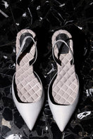 A pair of AERA Gabriella gray satin slingback heels with pointed toes and slender stiletto heels, stylish and elegant.