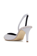 A pair of Gabriella gray satin slingback heels by AERA, featuring a sleek design and pointed toes, displayed on a neutral background.