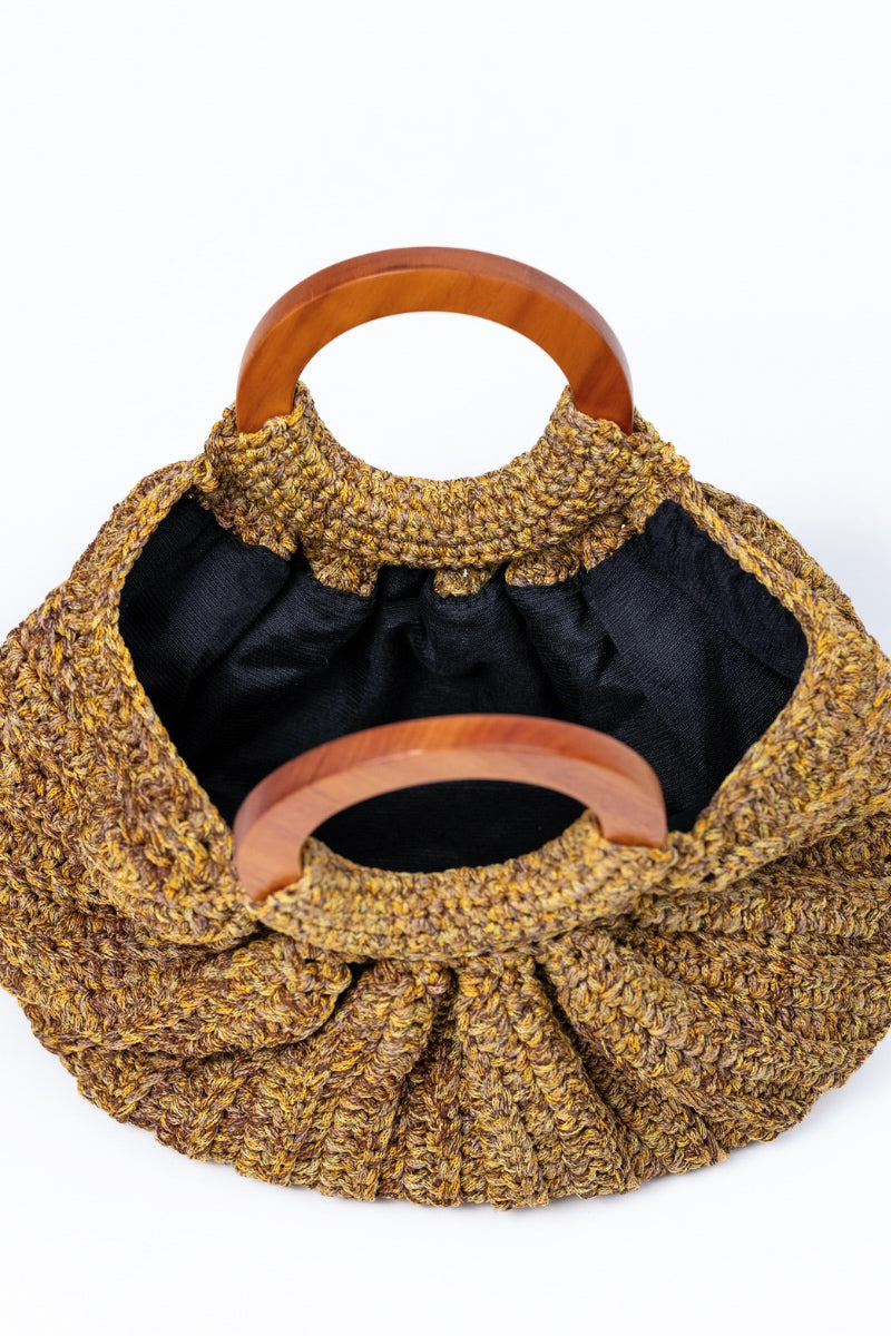 Beige Mara Brazil Gaia top handle bag with sleek design and structured shape, showcasing its elegant and versatile style.
