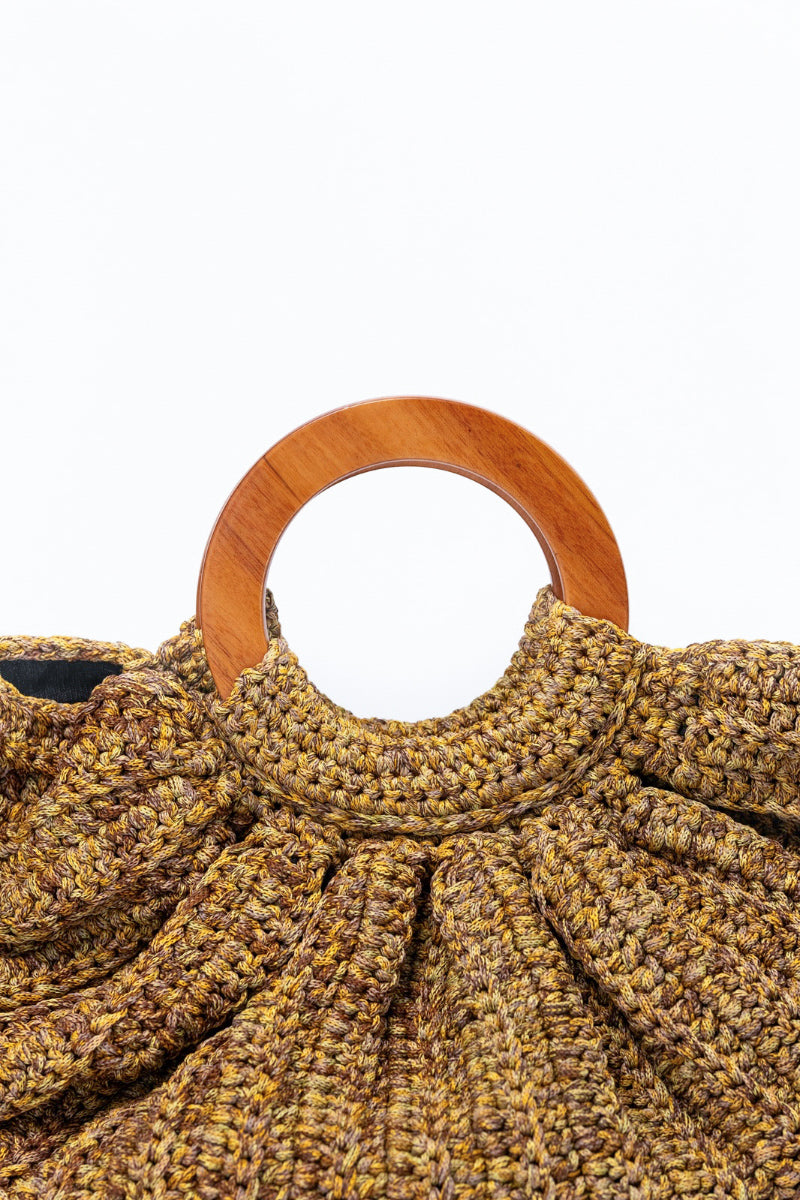 Beige Mara Brazil Gaia top handle bag with sleek design and structured shape, featuring a sturdy top handle and minimalist style.