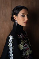 Nadya Shah Gaia Black Wisteria Cape jacket with flowing fabric and floral design, stylish outerwear for elegant occasions.