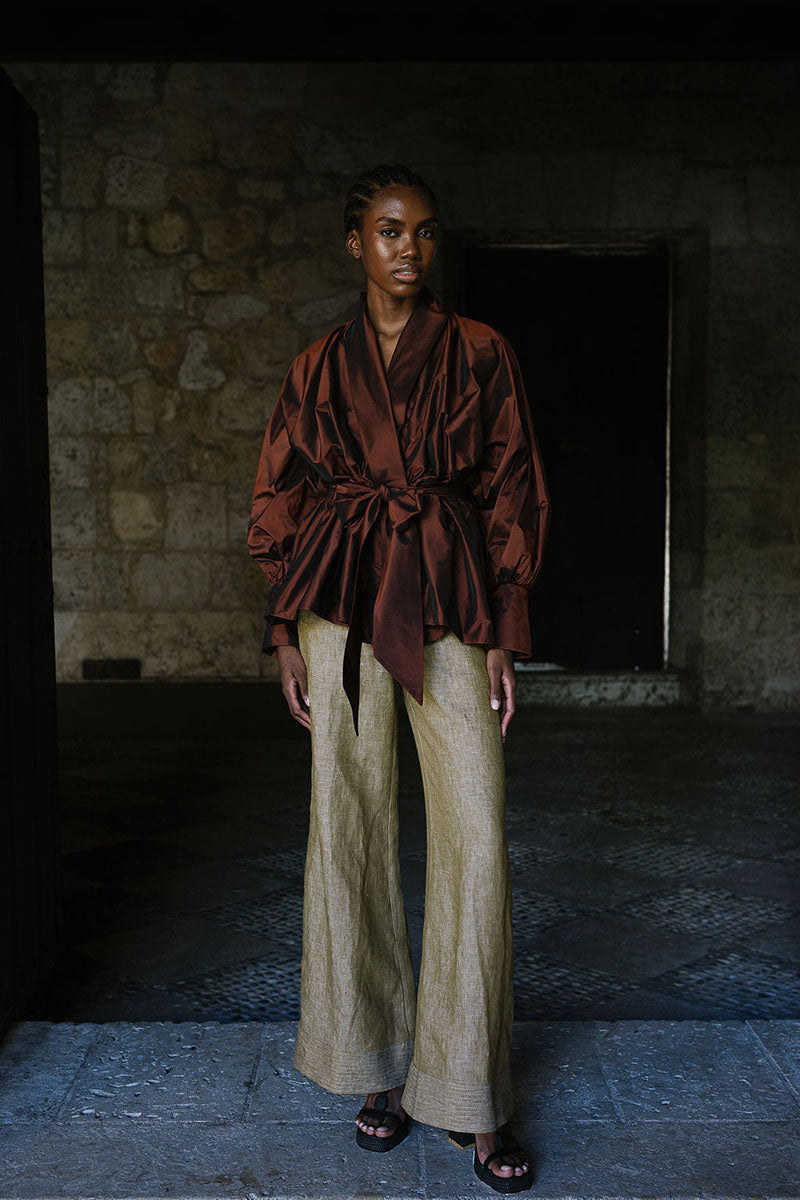 ANA + MARIA GALA top in mahogany, showing a stylish sleeveless blouse with a high neckline and soft fabric detail.
