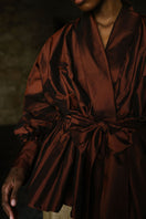 ANA + MARIA GALA top in mahogany, featuring a stylish blouse with elegant design and rich color, shown on a model.