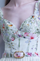 AISA Gardenia floral midi dress displayed on a hanger, featuring a flowy fabric and vibrant floral pattern.