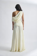 Off-white GEMMA gown by Deme By Gabriella featuring elegant fabric and a flowing silhouette, perfect for formal occasions.