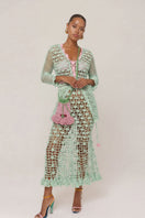 Andreeva California Mint handmade knit midi skirt featuring a fitted waist and soft, textured fabric.