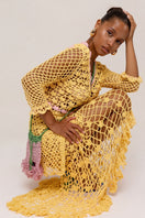 Handmade California yellow crochet shirt by Andreeva, featuring intricate knit details and a relaxed fit.