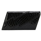 Black Terry de Havilland clutch bag with sleek design, featuring a smooth surface and elegant style for evening occasions.