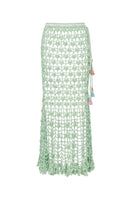 Andreeva California Mint handmade knit midi skirt displayed flat, showcasing its soft mint green color and textured knit fabric.