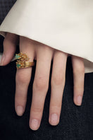 Gold Geo Emerald Ring by Fenomena featuring a geometric emerald centerpiece in a sleek gold band.