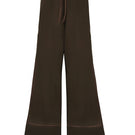 Nelblu Cyndi pant in brown, stylish cover-up pants with a comfortable fit, shown in a neutral color on a model.
