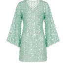 Nur Karaata Esplanade Palm Beach mini dress on ghost mannequin, showcasing a stylish and vibrant mini dress design.