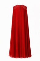 Red silk chiffon kaftan gown by SemSem, featuring flowing fabric and elegant drape, shown from a back view.