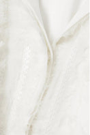 White silk chiffon blouse with embellishments from SemSem, featuring delicate fabric and intricate decorative details.