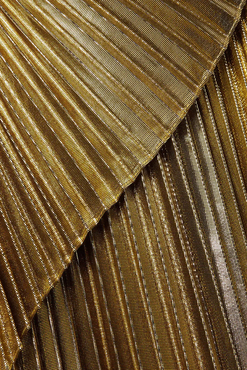 Gold metallic pleated maxi skirt by SemSem, featuring flowing fabric and a shiny, reflective finish.