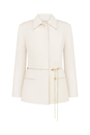White and gold belted jacket by Delegan displayed on a ghost mannequin, front view showing stylish design and belt details.