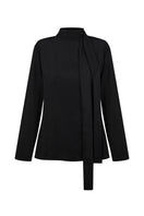 Black tie neck blouse from DELEGAN displayed on a ghost mannequin, showcasing its elegant design and classic shirt style.