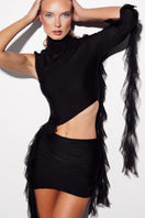 Black Giada mini skirt by Suncillo, shown in a close-up image highlighting the fitted waistband and sleek fabric.