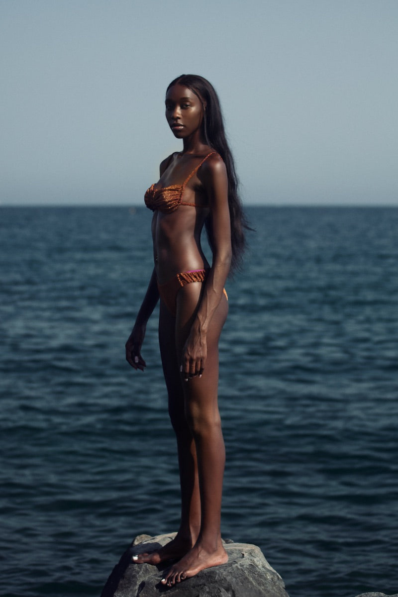 Suncillo Gina sparkly terracotta bikini top with adjustable straps and shimmering fabric, designed for beachwear and swimwear fashion.