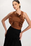 Black Ginevra maxi skirt by Ana + Maria, featuring a flowy silhouette and elegant design, shown on a model.